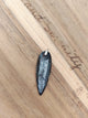 Pendentif fossile orthocéras - posé sur bois