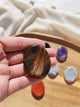 Pierre anti-stress ovale labradorite grise pierre naturelle tenue en main
